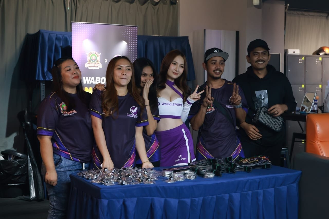 Guests beside the WABO Sport and BS Snooker championship merchandise display